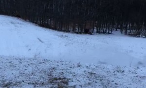 Snowmobile Stunt Almost Successful