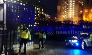 Brexit protesters yell 'traitor' at PM as she leaves Parliament