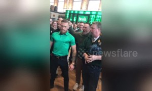 Conor McGregor shows off some moves while bagpipes play in Chicago
