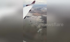 No way out of US city as flooding devastates roads and farmlands