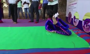 Indian girl sets world record for most forward rolls in contorted yoga pose