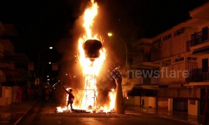 Spanish town burns massive head sculpture in fiery festival finale