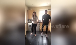 Siblings use kitchen tiles as synchronised dance mat