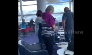 Travellers in Australia fall silent for New Zealand mosque victims