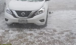 Hail Storm Beats and Batters a Car