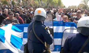 Tension flares as Greek protesters clash with police over Macedonia name deal
