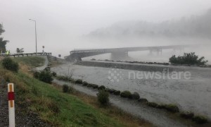 New Zealand bridge washes away as 'monster' rainstorm batters South Island