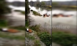 Good Samaritans rescue driver after car falls into river in China’s Guizhou