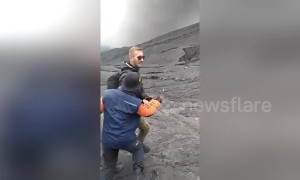 German tourist wrestles park ranger to ground after trying to hike erupting Indonesia volcano