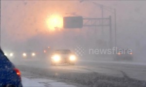 Eerie orange sunrise shines over morning traffic in New York state