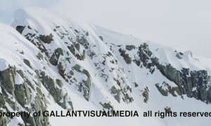 Snowmobile Sends It Off 150 Foot Drop