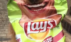 Smiling Dog Participates in Potato Chip Campaign
