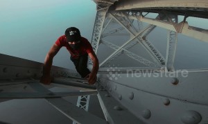 Fearless free-climber scales 'bridge over the clouds' in France