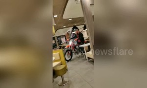 Drive through McDonald's anyone? Dutch man rides motorbike through fast-food restaurant