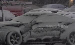 Heavy snow hits Toronto, Canada as winter weather returns for April