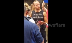 Anti-vegan protester eats raw squirrel in front of shocked Londoners