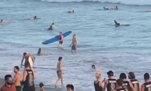 Surfer Surprised by Massive Wave