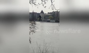 Real-life "Iron Man" flies over Prague river