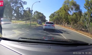 SUV Nearly Sideswipes Motorcyclist