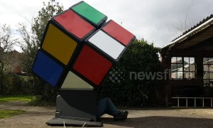 Ingenious UK man solves giant Rubik's Cube from the INSIDE