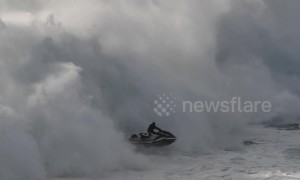 Surfer's massive wipeout followed by incredible jet ski rescue in Portugal