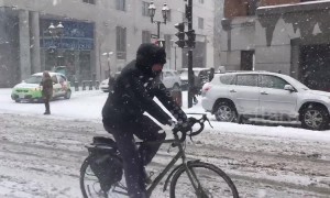 Snowstorm and ice leave quarter of million people without power in southern Quebec