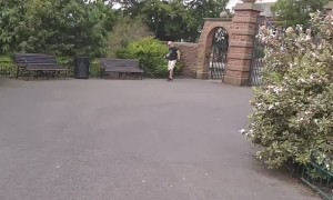 Man on Skateboard Goes Head First into Hedges