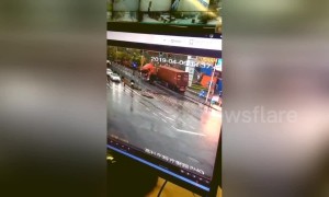 Woman has incredible near miss after out-of-control lorry crashes into roadside