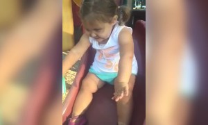 Toddler Girl Gets Stuck on Playground Slide