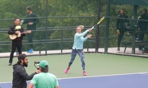 Tennis professional Ana Bogdan serenaded by Mariachi band during practice in Mexico