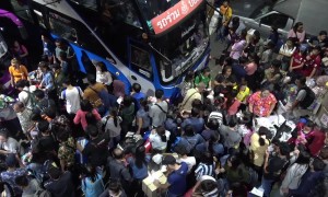 Thais cram onto buses and trains as they begin annual Songkran new year getaway