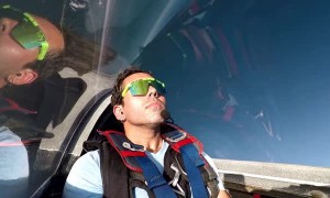 Stunt Pilot Snacks on Pizza