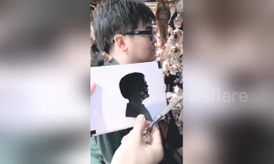 Astonishing Chinese street artist cuts paper profiles in one minute