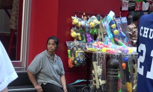 Tourists buy water guns and floral shirts for Thailand's Songkran new year festival