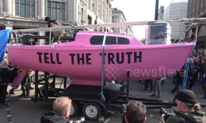 Climate change protesters bring London's Oxford Circus to standstill with pink boat