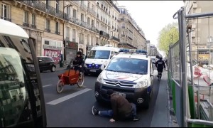 Man performs bizarre dance for police during yellow vest protest in Paris
