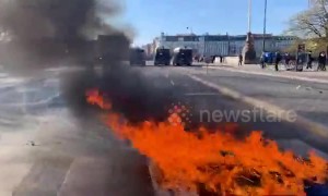 Angry demonstrators light fires on streets of Copenhagen