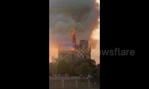 Shocking moment iconic Notre-Dame spire collapses into flames