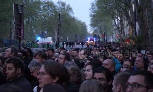 Parisians watch in stunned silence as Notre Dame goes up in flames