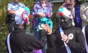 Controversial dance group 'blacks up' for annual Easter tradition