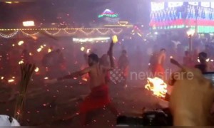 Indian devotees engage in fire-throwing fight to appease Hindu goddess
