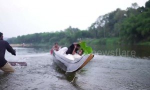 Indian couple end up falling into river trying to get perfect wedding photo