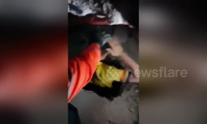 Dramatic moment survivor is pulled alive from rubble of earthquake-hit supermarket in the Philippines