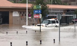UK tourist spots cars wading through deep water as Spanish town flooded