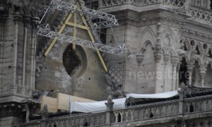 Notre-Dame covered in tarpaulin to protect it from expected rain