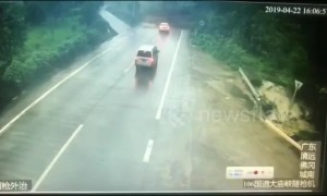 Narrow escape! Driver stops in time to avoid landslide in China