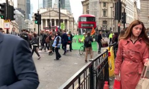 Extinction Rebellion protesters block traffic outside Bank of England in London
