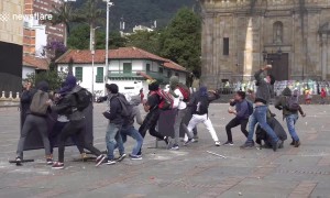 Protesters clash with riot police during nation-wide strike in Colombia