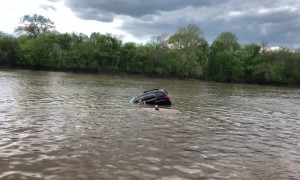 Woman Rescued from Sinking Car