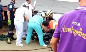 Motorcyclist survives building collapse during tropical storms in Thailand